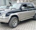 Серый Мицубиси Л 200, объемом двигателя 2.5 л и пробегом 288 тыс. км за 4488 $, фото 1 на Automoto.ua