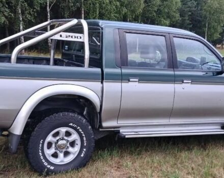 Серый Мицубиси Л 200, объемом двигателя 2.5 л и пробегом 224 тыс. км за 2550 $, фото 9 на Automoto.ua