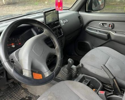 Серый Мицубиси Л 200, объемом двигателя 2.5 л и пробегом 100 тыс. км за 4700 $, фото 4 на Automoto.ua