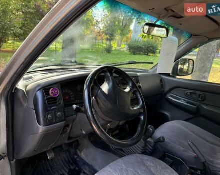 Серый Мицубиси Л 200, объемом двигателя 2.5 л и пробегом 621 тыс. км за 8790 $, фото 11 на Automoto.ua