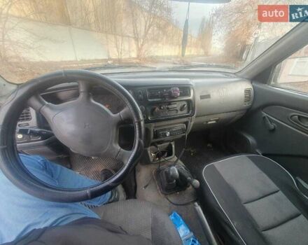 Сірий Міцубісі Л 200, об'ємом двигуна 2.5 л та пробігом 663 тис. км за 5500 $, фото 7 на Automoto.ua