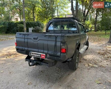 Серый Мицубиси Л 200, объемом двигателя 2.5 л и пробегом 621 тыс. км за 8790 $, фото 5 на Automoto.ua