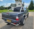 Серый Мицубиси Л 200, объемом двигателя 2.5 л и пробегом 100 тыс. км за 7856 $, фото 10 на Automoto.ua