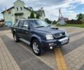 Серый Мицубиси Л 200, объемом двигателя 2.5 л и пробегом 100 тыс. км за 7856 $, фото 1 на Automoto.ua