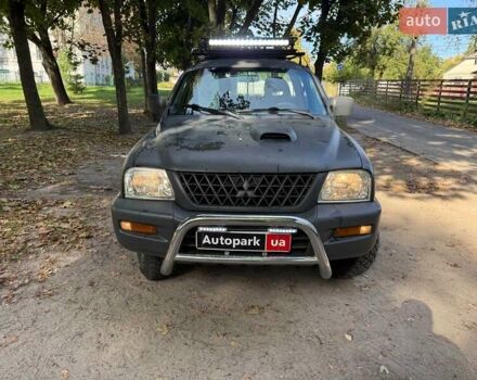 Серый Мицубиси Л 200, объемом двигателя 2.5 л и пробегом 621 тыс. км за 8790 $, фото 1 на Automoto.ua