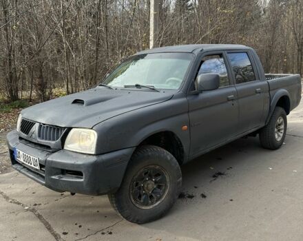 Серый Мицубиси Л 200, объемом двигателя 2.2 л и пробегом 200 тыс. км за 3550 $, фото 4 на Automoto.ua