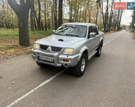 Серый Мицубиси Л 200, объемом двигателя 2.5 л и пробегом 260 тыс. км за 6669 $, фото 5 на Automoto.ua