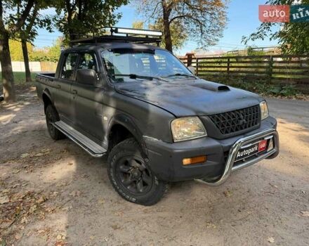 Серый Мицубиси Л 200, объемом двигателя 2.5 л и пробегом 621 тыс. км за 8790 $, фото 3 на Automoto.ua