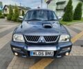 Серый Мицубиси Л 200, объемом двигателя 2.5 л и пробегом 100 тыс. км за 7856 $, фото 3 на Automoto.ua