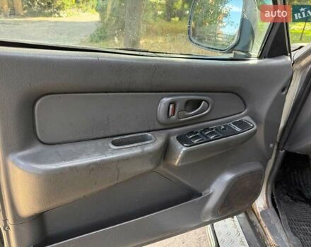 Серый Мицубиси Л 200, объемом двигателя 2.5 л и пробегом 621 тыс. км за 8790 $, фото 10 на Automoto.ua