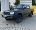 Серый Мицубиси Л 200, объемом двигателя 2.5 л и пробегом 250 тыс. км за 4300 $, фото 1 на Automoto.ua
