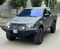 Серый Мицубиси Л 200, объемом двигателя 2.5 л и пробегом 320 тыс. км за 6391 $, фото 1 на Automoto.ua