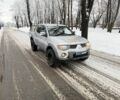 Серый Мицубиси Л 200, объемом двигателя 2.5 л и пробегом 172 тыс. км за 6921 $, фото 1 на Automoto.ua
