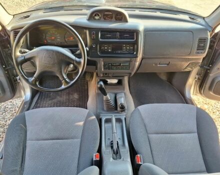 Серый Мицубиси Л 200, объемом двигателя 2.5 л и пробегом 247 тыс. км за 2600 $, фото 6 на Automoto.ua