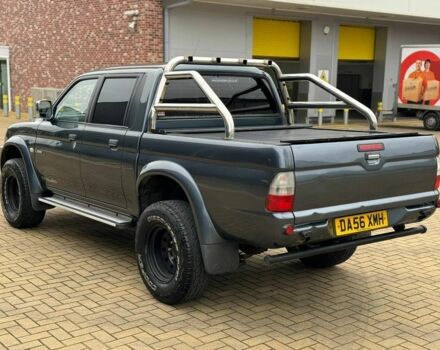 Серый Мицубиси Л 200, объемом двигателя 2 л и пробегом 212 тыс. км за 9941 $, фото 7 на Automoto.ua