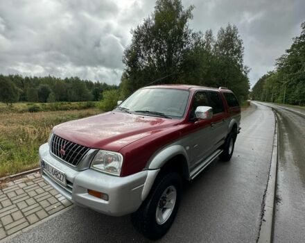 Серый Мицубиси Л 200, объемом двигателя 2 л и пробегом 245 тыс. км за 5241 $, фото 2 на Automoto.ua