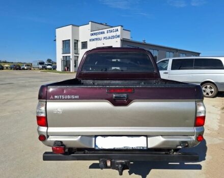 Серый Мицубиси Л 200, объемом двигателя 2.5 л и пробегом 244 тыс. км за 2650 $, фото 5 на Automoto.ua