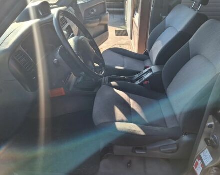 Серый Мицубиси Л 200, объемом двигателя 2.5 л и пробегом 247 тыс. км за 2600 $, фото 7 на Automoto.ua