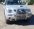 Серый Мицубиси Л 200, объемом двигателя 2.5 л и пробегом 250 тыс. км за 5400 $, фото 1 на Automoto.ua