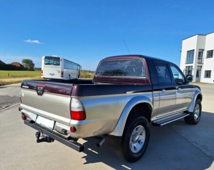 Серый Мицубиси Л 200, объемом двигателя 2.5 л и пробегом 244 тыс. км за 2650 $, фото 3 на Automoto.ua