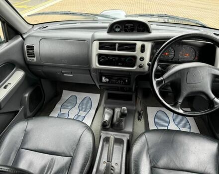 Серый Мицубиси Л 200, объемом двигателя 2 л и пробегом 212 тыс. км за 9941 $, фото 3 на Automoto.ua