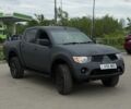 Серый Мицубиси Л 200, объемом двигателя 2.5 л и пробегом 250 тыс. км за 5500 $, фото 1 на Automoto.ua