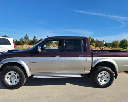 Серый Мицубиси Л 200, объемом двигателя 2.5 л и пробегом 247 тыс. км за 2600 $, фото 2 на Automoto.ua