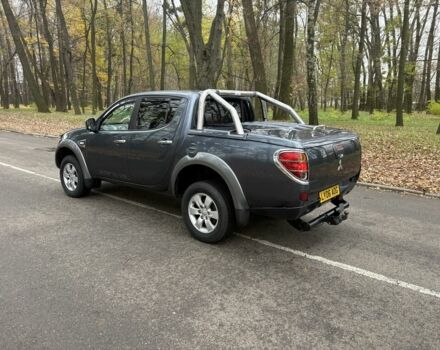 Серый Мицубиси Л 200, объемом двигателя 2.5 л и пробегом 130 тыс. км за 7452 $, фото 3 на Automoto.ua