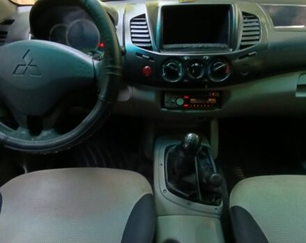 Серый Мицубиси Л 200, объемом двигателя 2.5 л и пробегом 270 тыс. км за 11800 $, фото 14 на Automoto.ua