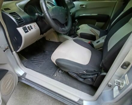 Серый Мицубиси Л 200, объемом двигателя 2.5 л и пробегом 270 тыс. км за 11800 $, фото 20 на Automoto.ua