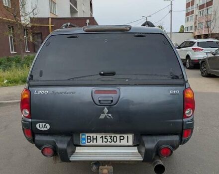 Серый Мицубиси Л 200, объемом двигателя 2.48 л и пробегом 309 тыс. км за 10999 $, фото 3 на Automoto.ua