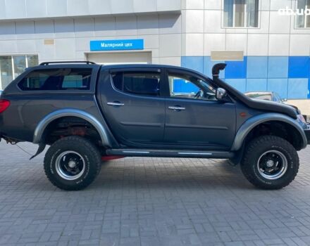 Серый Мицубиси Л 200, объемом двигателя 2.5 л и пробегом 132 тыс. км за 16490 $, фото 10 на Automoto.ua