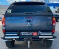 Серый Мицубиси Л 200, объемом двигателя 2.5 л и пробегом 132 тыс. км за 16490 $, фото 8 на Automoto.ua