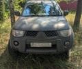 Серый Мицубиси Л 200, объемом двигателя 2.5 л и пробегом 320 тыс. км за 7000 $, фото 1 на Automoto.ua