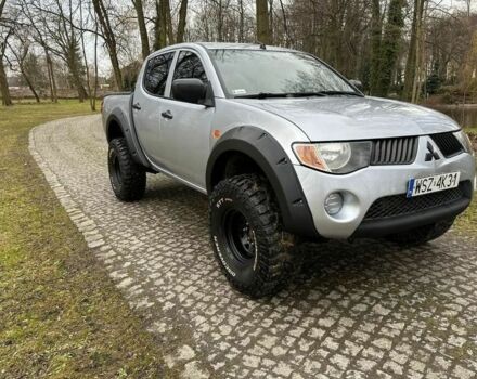 Серый Мицубиси Л 200, объемом двигателя 2.5 л и пробегом 215 тыс. км за 4200 $, фото 2 на Automoto.ua