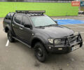 Серый Мицубиси Л 200, объемом двигателя 2.48 л и пробегом 185 тыс. км за 13500 $, фото 2 на Automoto.ua