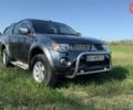 Серый Мицубиси Л 200, объемом двигателя 2.48 л и пробегом 234 тыс. км за 13000 $, фото 5 на Automoto.ua