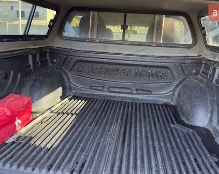 Серый Мицубиси Л 200, объемом двигателя 2.48 л и пробегом 234 тыс. км за 13000 $, фото 37 на Automoto.ua