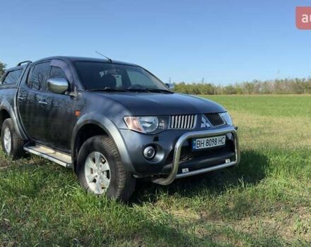 Серый Мицубиси Л 200, объемом двигателя 2.48 л и пробегом 234 тыс. км за 13000 $, фото 1 на Automoto.ua