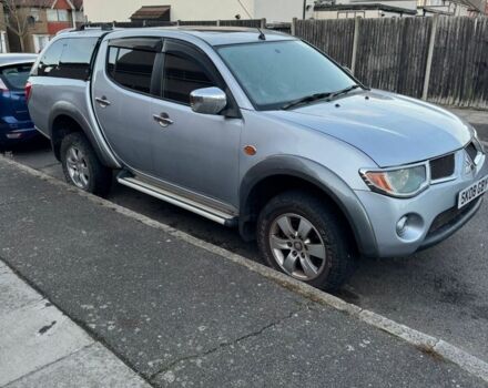 Серый Мицубиси Л 200, объемом двигателя 2.5 л и пробегом 116 тыс. км за 6384 $, фото 1 на Automoto.ua