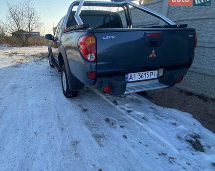 Серый Мицубиси Л 200, объемом двигателя 2.48 л и пробегом 252 тыс. км за 13700 $, фото 1 на Automoto.ua