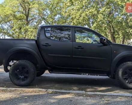 Серый Мицубиси Л 200, объемом двигателя 2.48 л и пробегом 291 тыс. км за 11999 $, фото 10 на Automoto.ua