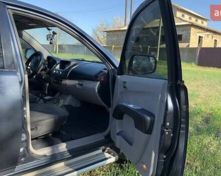 Серый Мицубиси Л 200, объемом двигателя 2.48 л и пробегом 234 тыс. км за 13000 $, фото 27 на Automoto.ua