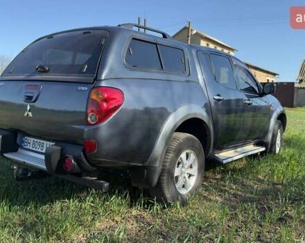Серый Мицубиси Л 200, объемом двигателя 2.48 л и пробегом 234 тыс. км за 13000 $, фото 19 на Automoto.ua