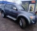 Серый Мицубиси Л 200, объемом двигателя 2.48 л и пробегом 270 тыс. км за 12500 $, фото 1 на Automoto.ua