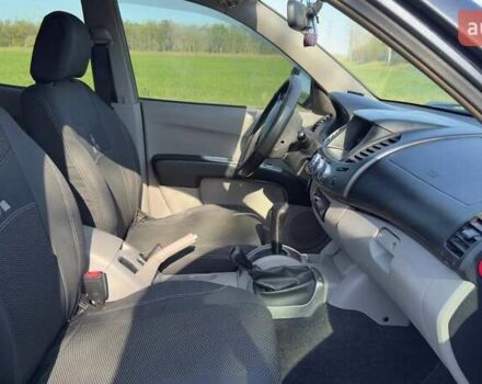 Серый Мицубиси Л 200, объемом двигателя 2.48 л и пробегом 234 тыс. км за 13000 $, фото 29 на Automoto.ua