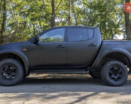 Серый Мицубиси Л 200, объемом двигателя 2.48 л и пробегом 291 тыс. км за 11999 $, фото 5 на Automoto.ua