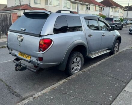 Серый Мицубиси Л 200, объемом двигателя 2.5 л и пробегом 116 тыс. км за 6384 $, фото 2 на Automoto.ua