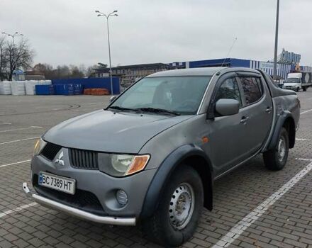 Серый Мицубиси Л 200, объемом двигателя 2.48 л и пробегом 397 тыс. км за 9000 $, фото 1 на Automoto.ua