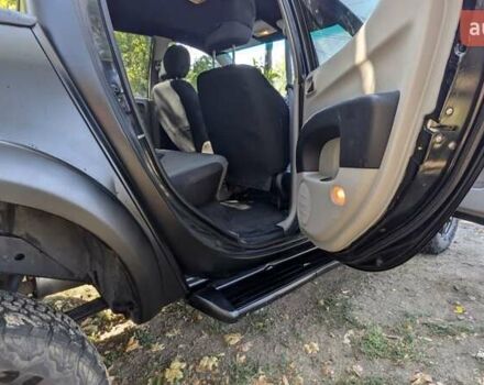 Серый Мицубиси Л 200, объемом двигателя 2.48 л и пробегом 291 тыс. км за 11999 $, фото 1 на Automoto.ua